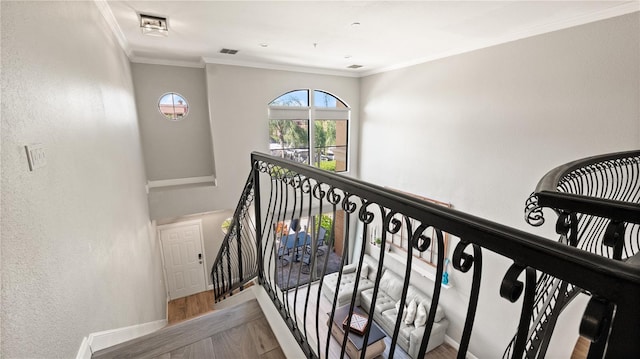 2741 Via Cipriani Unit 916A, Clearwater, FL 33764 - stairs with wood finished floors and crown molding