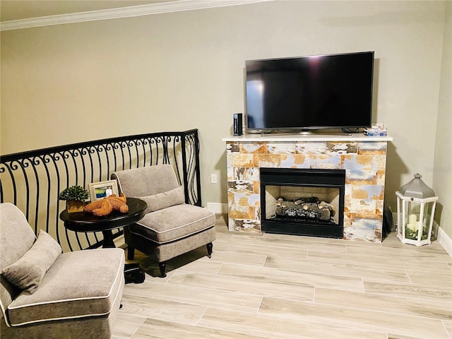 2741 Via Cipriani Unit 916A, Clearwater, FL 33764 - living room with crown molding, a stone fireplace, and wood finished floors