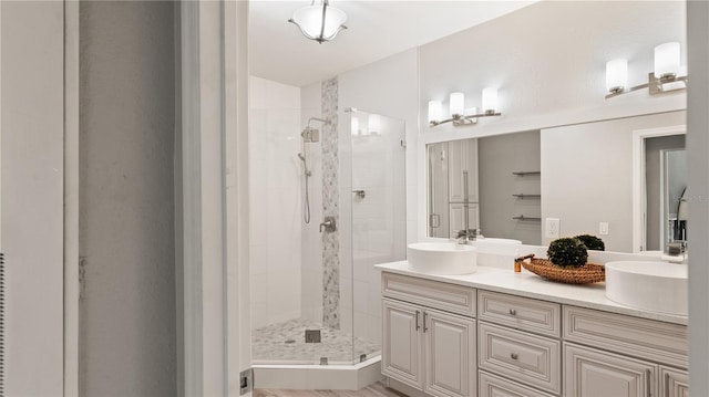 2741 Via Cipriani Unit 916A, Clearwater, FL 33764 - full bathroom with a stall shower and double vanity
