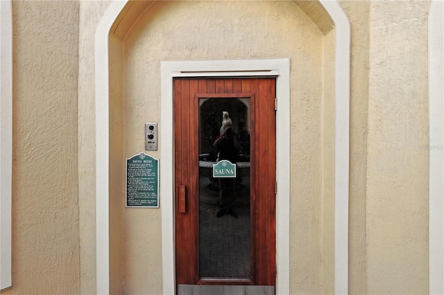 2741 Via Cipriani Unit 916A, Clearwater, FL 33764 - property entrance with stucco siding