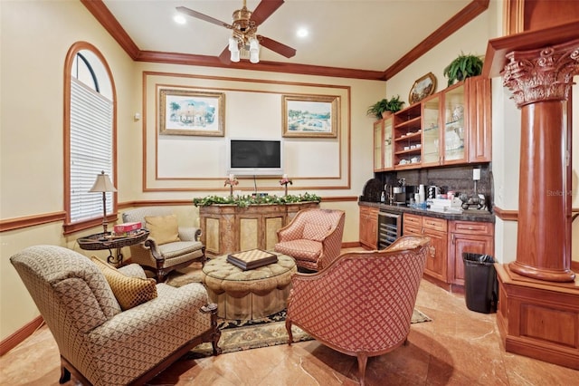 2741 Via Cipriani Unit 916A, Clearwater, FL 33764 - living room with beverage cooler, crown molding, decorative columns, ceiling fan, and recessed lighting