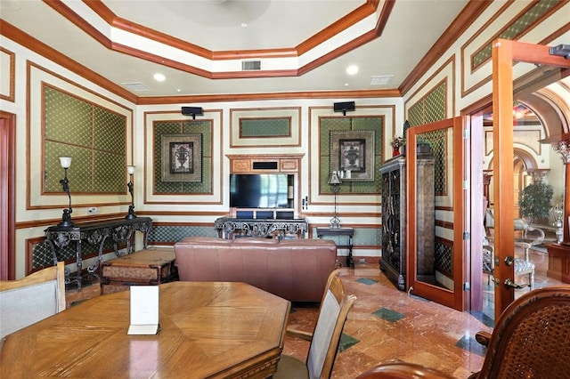 2741 Via Cipriani Unit 916A, Clearwater, FL 33764 - dining space featuring ornamental molding, a tray ceiling, and wallpapered walls