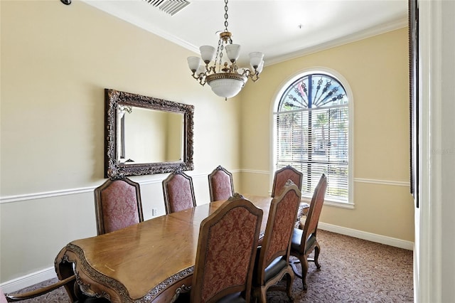 2741 Via Cipriani Unit 916A, Clearwater, FL 33764 - carpeted dining area with a chandelier and ornamental molding