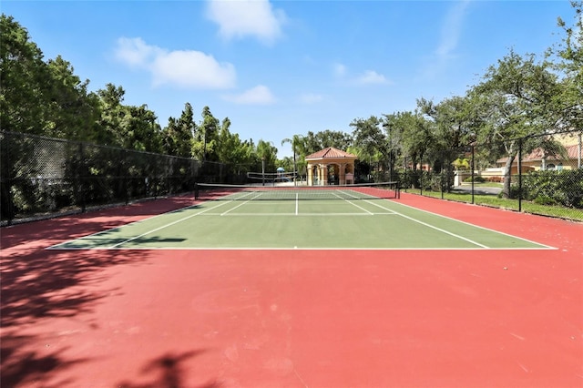 2741 Via Cipriani Unit 916A, Clearwater, FL 33764 - view of tennis court featuring a gazebo and community basketball court