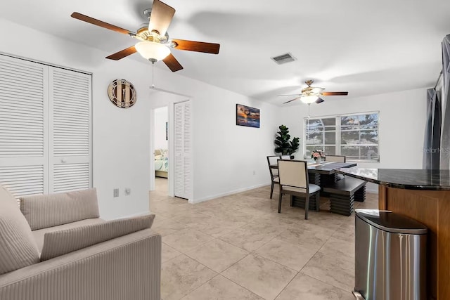18093 Ohara Dr, Port Charlotte, FL 33948 - office with a ceiling fan and light tile patterned flooring