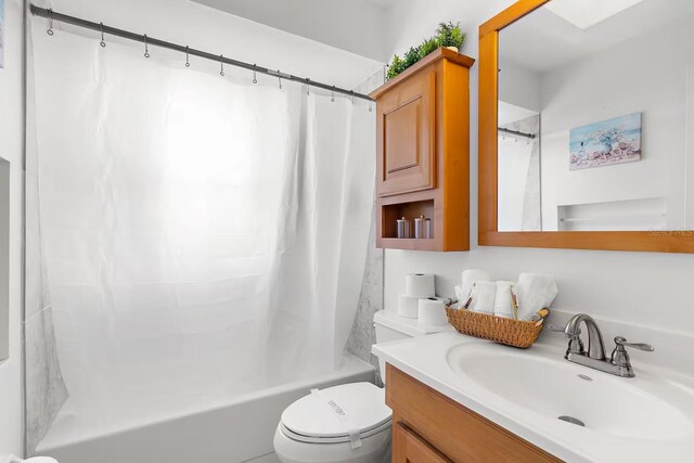 18093 Ohara Dr, Port Charlotte, FL 33948 - bathroom featuring vanity and shower / bath combo with shower curtain