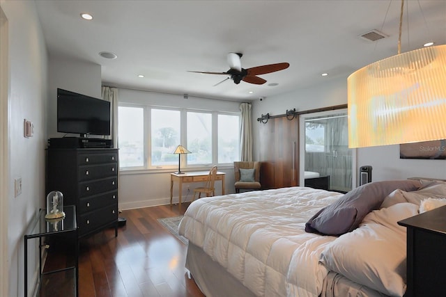 3956 Versailles Dr, Tampa, FL 33634 - bedroom featuring wood finished floors, recessed lighting, and a ceiling fan