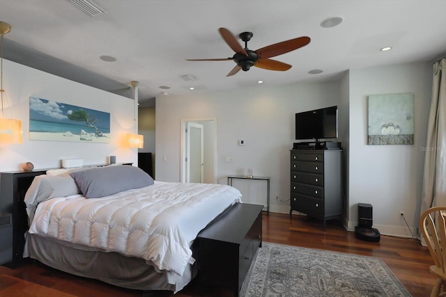 3956 Versailles Dr, Tampa, FL 33634 - bedroom with wood finished floors, ceiling fan, and recessed lighting