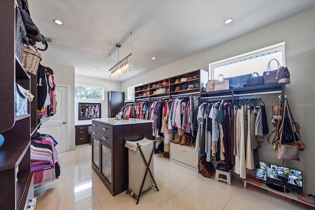 3956 Versailles Dr, Tampa, FL 33634 - walk in closet with light tile patterned floors