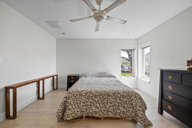 3956 Versailles Dr, Tampa, FL 33634 - bedroom with light wood-style floors, ceiling fan, and recessed lighting