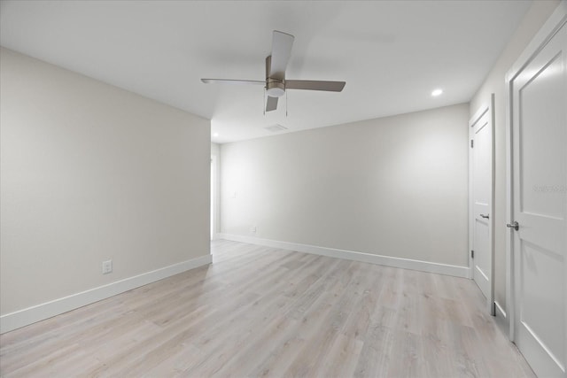 3956 Versailles Dr, Tampa, FL 33634 - unfurnished room featuring light wood-style floors, a ceiling fan, and recessed lighting