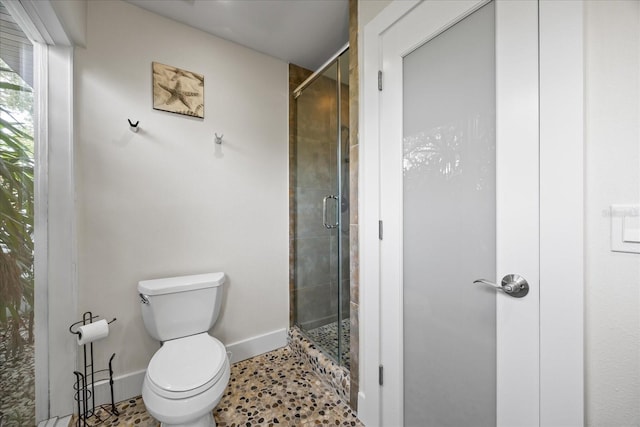 3956 Versailles Dr, Tampa, FL 33634 - full bathroom featuring toilet and a shower stall