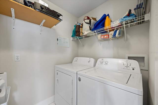 3956 Versailles Dr, Tampa, FL 33634 - washroom with separate washer and dryer and baseboards