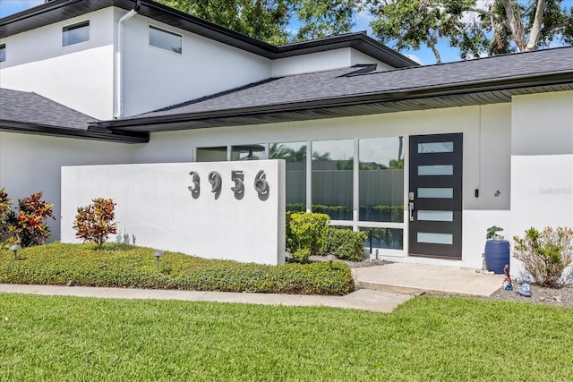 3956 Versailles Dr, Tampa, FL 33634 - community sign featuring a lawn
