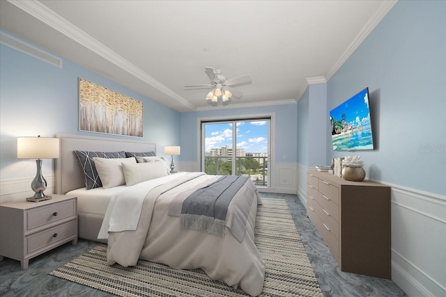125 Belleview Blvd Unit 503, Belleair, FL 33756 - carpeted bedroom featuring crown molding, a wainscoted wall, a decorative wall, and ceiling fan
