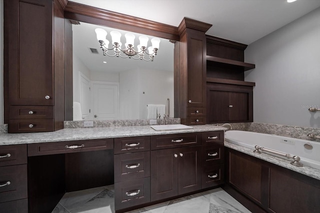 125 Belleview Blvd Unit 503, Belleair, FL 33756 - bathroom with marble look tile flooring, a garden tub, and double vanity