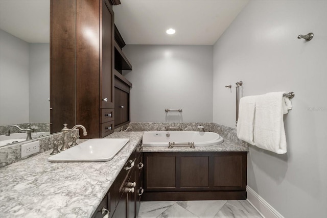 125 Belleview Blvd Unit 503, Belleair, FL 33756 - bathroom with a bath, marble finish flooring, and vanity