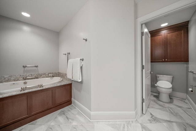 125 Belleview Blvd Unit 503, Belleair, FL 33756 - full bathroom with marble look tile flooring, a garden tub, and recessed lighting
