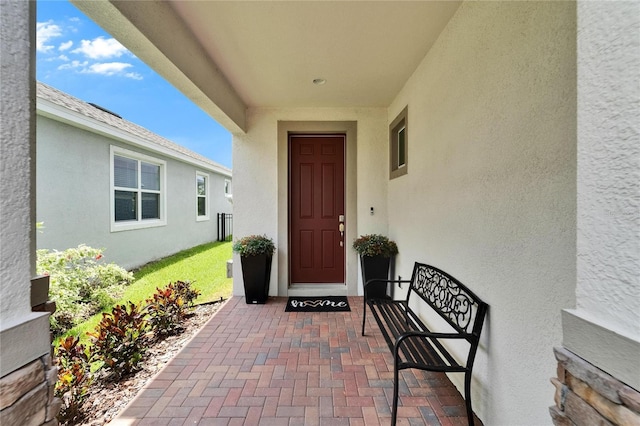 5611 Del Coronado Dr, Apollo Beach, FL 33572 - property entrance featuring stucco siding