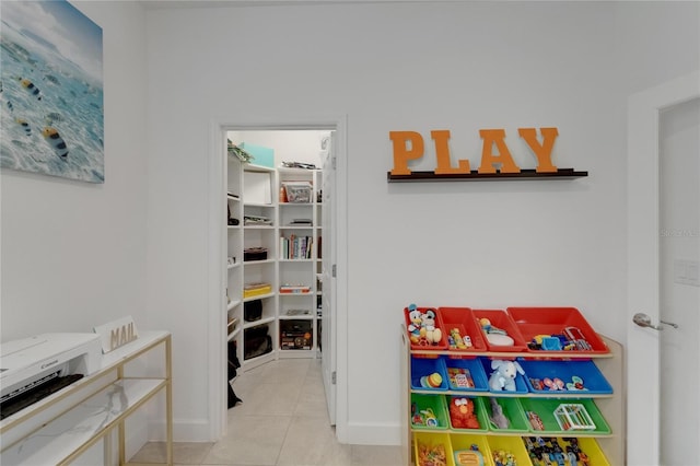 5611 Del Coronado Dr, Apollo Beach, FL 33572 - playroom with tile patterned floors and baseboards