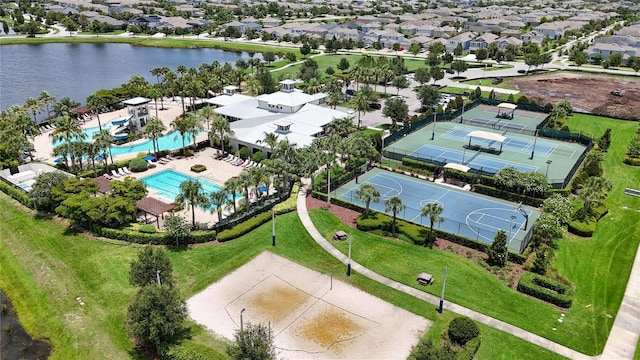 5611 Del Coronado Dr, Apollo Beach, FL 33572 - drone / aerial view of a pool and a large body of water