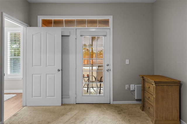5000 Culbreath Key Way Unit 1-112, Tampa, FL 33611 - entryway with carpet and plenty of natural light