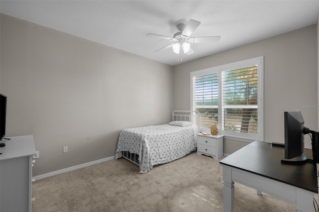5000 Culbreath Key Way Unit 1-112, Tampa, FL 33611 - bedroom with light colored carpet and ceiling fan