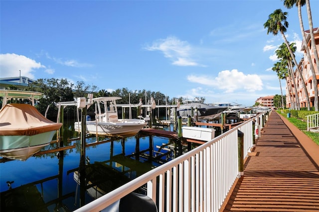 5000 Culbreath Key Way Unit 1-112, Tampa, FL 33611 - dock featuring boat lift and a water view
