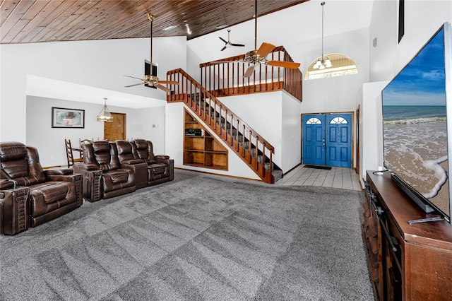 11203 Egret Nest Ct, Riverview, FL 33569 - living room with ceiling fan, high vaulted ceiling, stairs, wood ceiling, and carpet floors