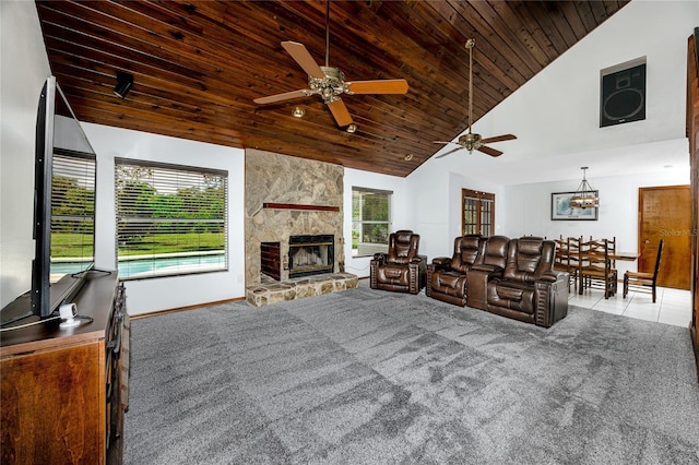 11203 Egret Nest Ct, Riverview, FL 33569 - living area featuring ceiling fan, wood ceiling, a fireplace, high vaulted ceiling, and carpet flooring