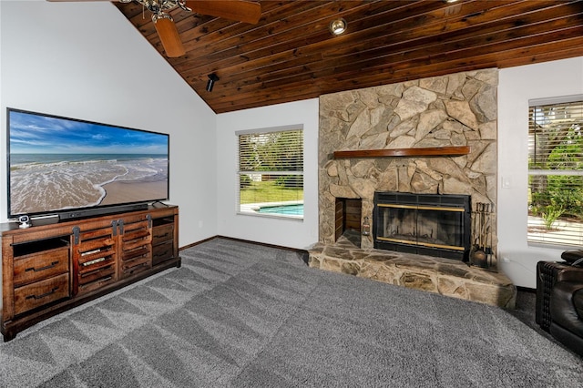 11203 Egret Nest Ct, Riverview, FL 33569 - carpeted living room featuring ceiling fan, lofted ceiling, a fireplace, and wood ceiling