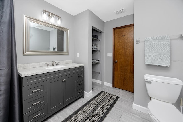 11203 Egret Nest Ct, Riverview, FL 33569 - bathroom featuring vanity and a closet