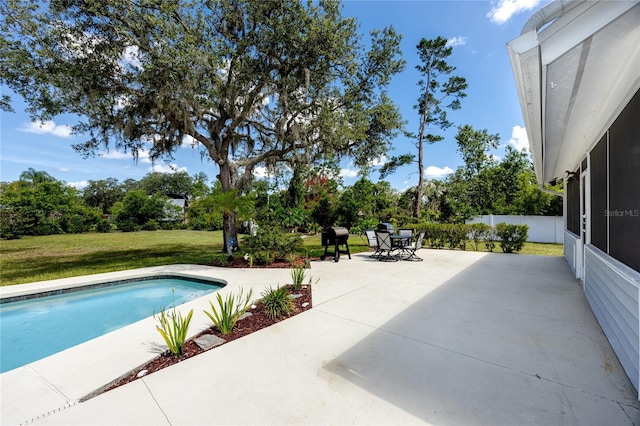 11203 Egret Nest Ct, Riverview, FL 33569 - view of pool featuring a patio, a yard, and a sunroom