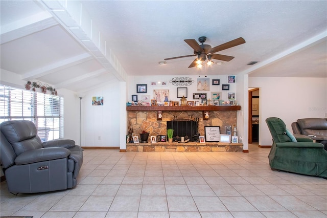 4205 Helene Pl, Valrico, FL 33594 - living room featuring a ceiling fan, a stone fireplace, and light tile patterned floors