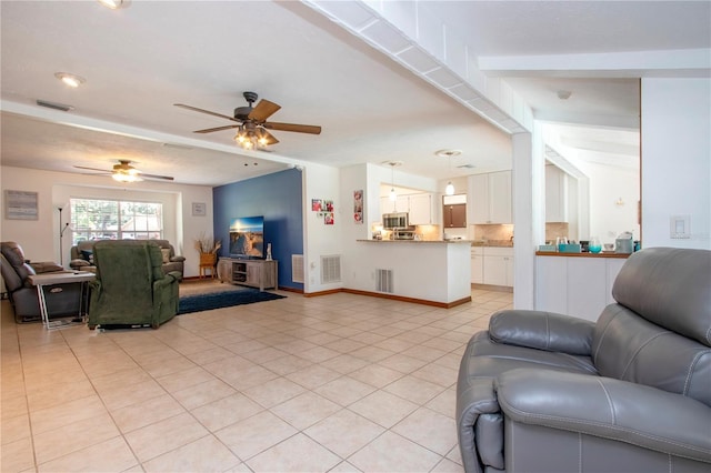 4205 Helene Pl, Valrico, FL 33594 - living room featuring ceiling fan and light tile patterned floors