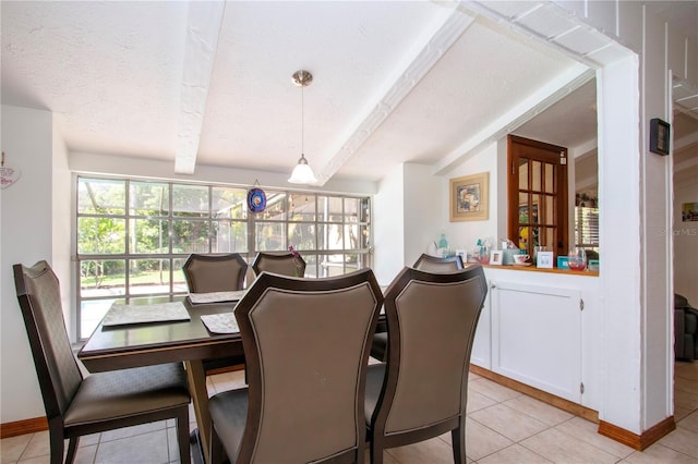4205 Helene Pl, Valrico, FL 33594 - dining room with light tile patterned flooring and a textured ceiling