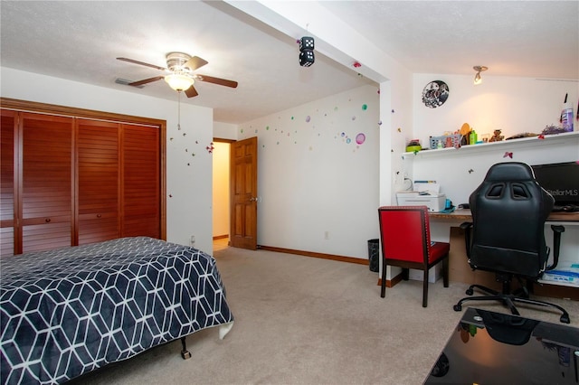 4205 Helene Pl, Valrico, FL 33594 - bedroom featuring an office area, carpet, a closet, and a ceiling fan