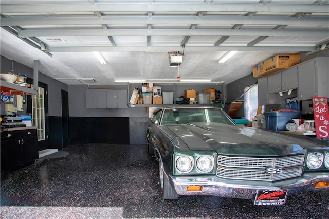 4205 Helene Pl, Valrico, FL 33594 - garage featuring a garage door opener