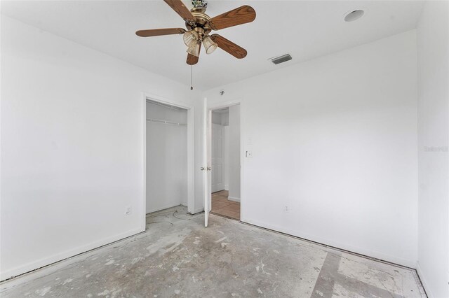 1041 SE Spinnaker Ave, Saint Lucie West, FL 34983 - unfurnished bedroom featuring a closet and ceiling fan