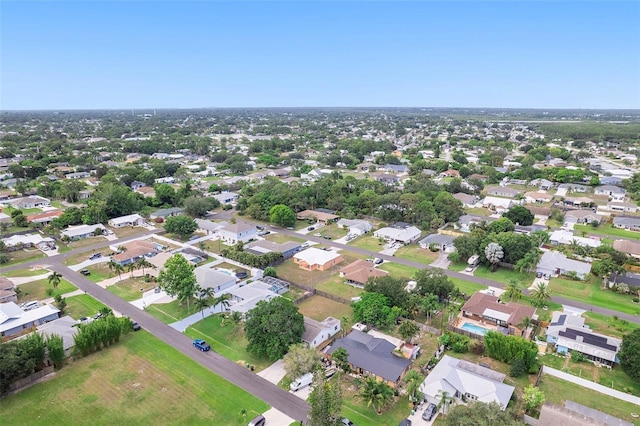 1041 SE Spinnaker Ave, Saint Lucie West, FL 34983 - aerial overview of property's location with nearby suburban area