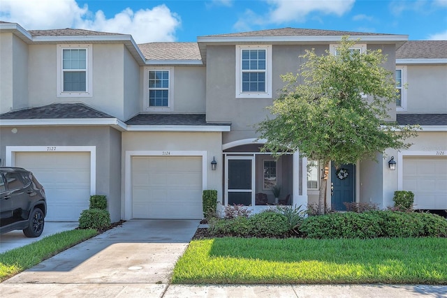 7124 Summer Holly Pl, Riverview, FL 33578 - multi unit property with an attached garage, stucco siding, and driveway