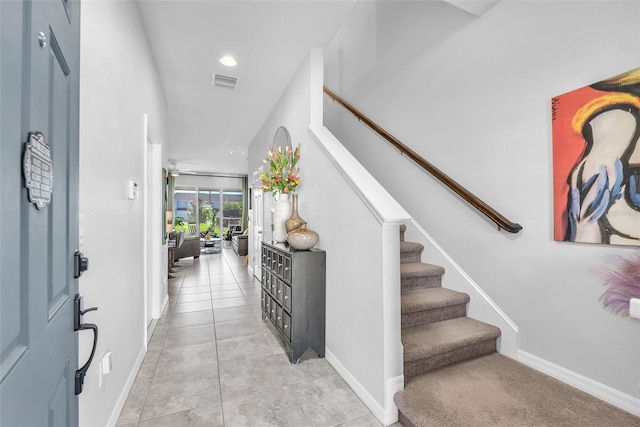 7124 Summer Holly Pl, Riverview, FL 33578 - foyer entrance featuring stairs and light tile patterned floors