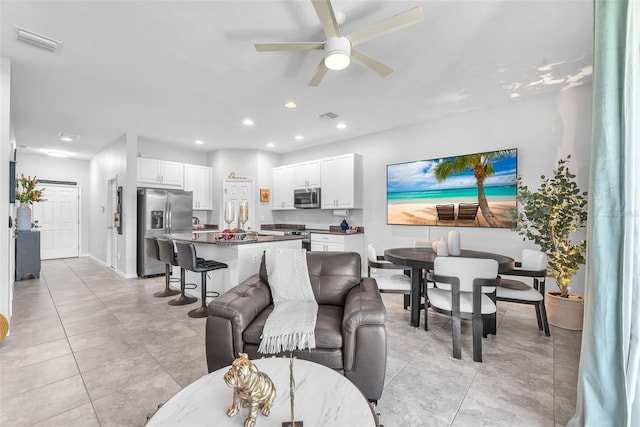 7124 Summer Holly Pl, Riverview, FL 33578 - living area with a ceiling fan, recessed lighting, and light tile patterned floors