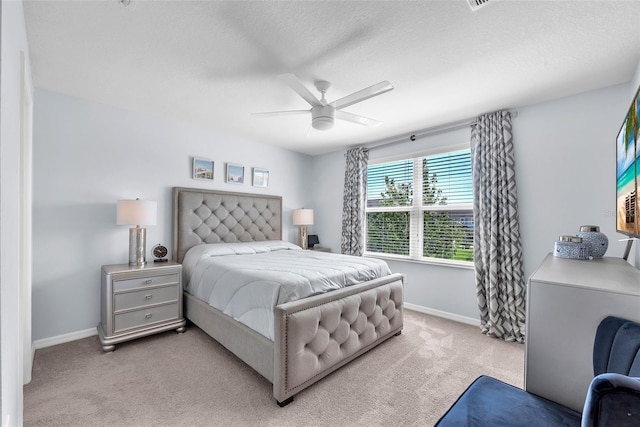 7124 Summer Holly Pl, Riverview, FL 33578 - bedroom featuring light colored carpet, ceiling fan, and a textured ceiling