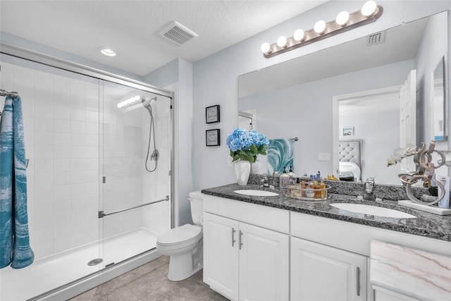 7124 Summer Holly Pl, Riverview, FL 33578 - ensuite bathroom with double vanity, a stall shower, and tile patterned flooring