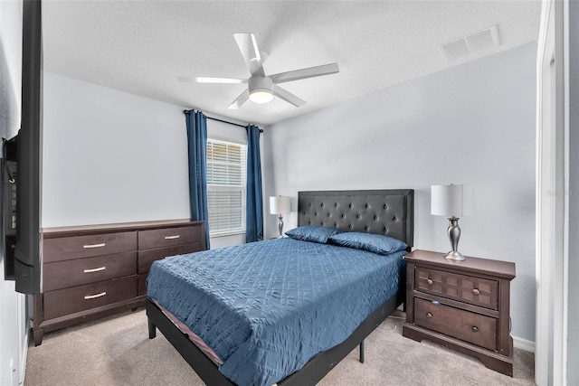 7124 Summer Holly Pl, Riverview, FL 33578 - carpeted bedroom with a ceiling fan and a textured ceiling