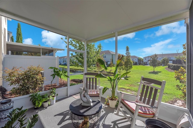 7124 Summer Holly Pl, Riverview, FL 33578 - sunroom featuring healthy amount of natural light, a water view, and a residential view