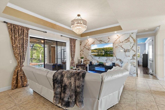 8358 Dunham Station Dr, Tampa, FL 33647 - living area with crown molding, light tile patterned floors, a chandelier, and a tray ceiling