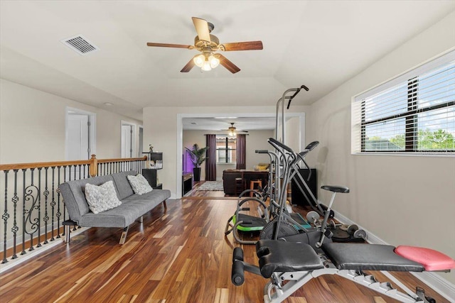 8358 Dunham Station Dr, Tampa, FL 33647 - exercise area featuring a ceiling fan and wood finished floors