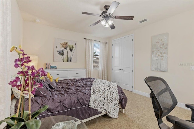 8358 Dunham Station Dr, Tampa, FL 33647 - bedroom featuring carpet floors and ceiling fan